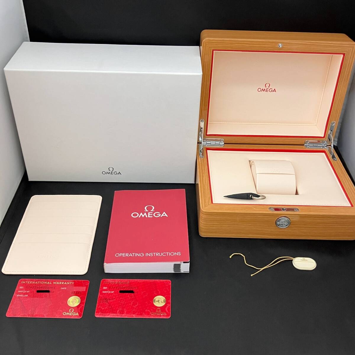 OMEGA Speedmaster 326.21.40.50 Automatic Omega Speedmaster Racing Co-Axial Watch with Box, Manual, and Warranty