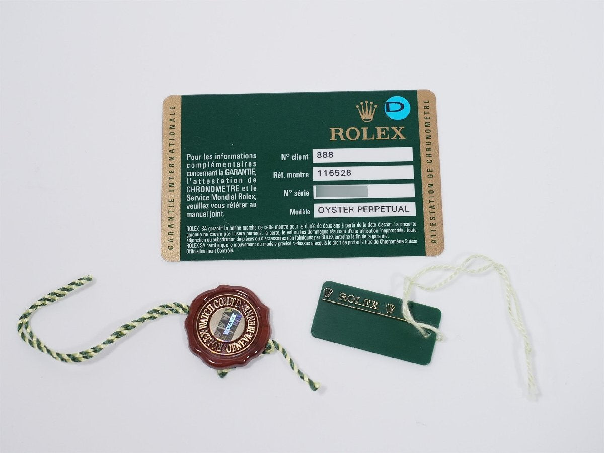Rolex Daytona Ref. 116528 Yellow Gold with White Shell and 8 Diamond Dial