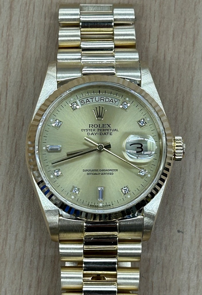 Rolex Oyster Perpetual Day Date with 10 Diamonds in 18K Yellow Gold and Champagne 18038A