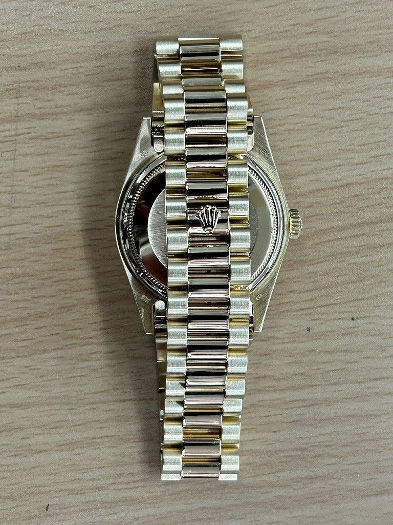 Rolex Oyster Perpetual Day Date with 10 Diamonds in 18K Yellow Gold and Champagne 18038A