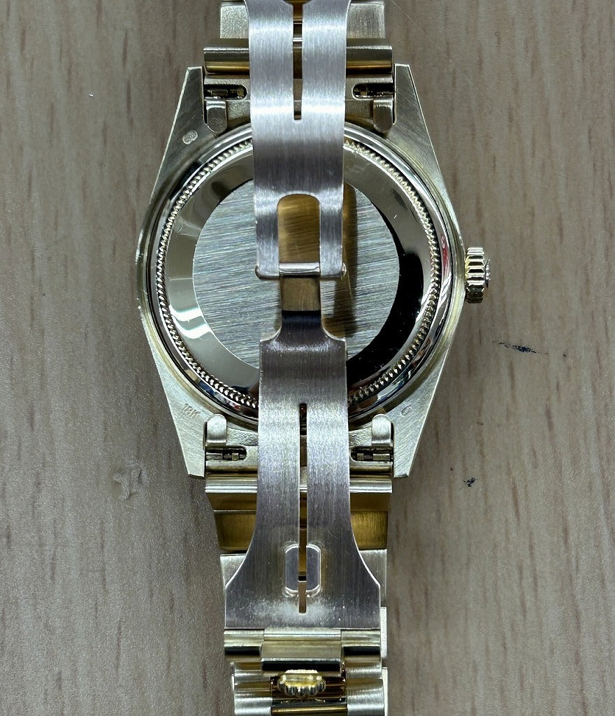 Rolex Oyster Perpetual Day Date with 10 Diamonds in 18K Yellow Gold and Champagne 18038A