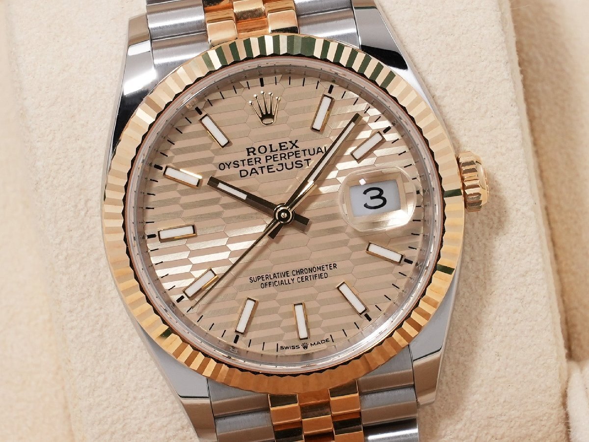 Rolex Datejust 36 Ref. 126233 Stainless Steel/Yellow Gold Champagne Fluted Motif Dial