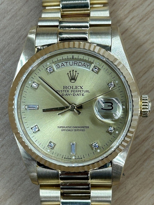 Rolex Oyster Perpetual Day Date with 10 Diamonds in 18K Yellow Gold and Champagne 18038A