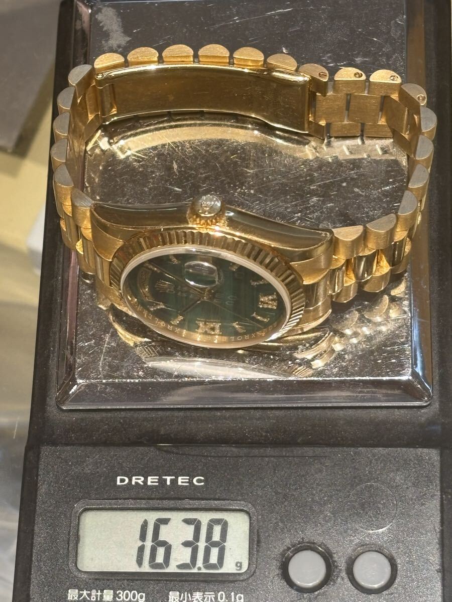 Rolex ref118238 Day Date 18KYG solid dial is a malachite red dial.